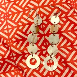 A pair of earrings worn twice